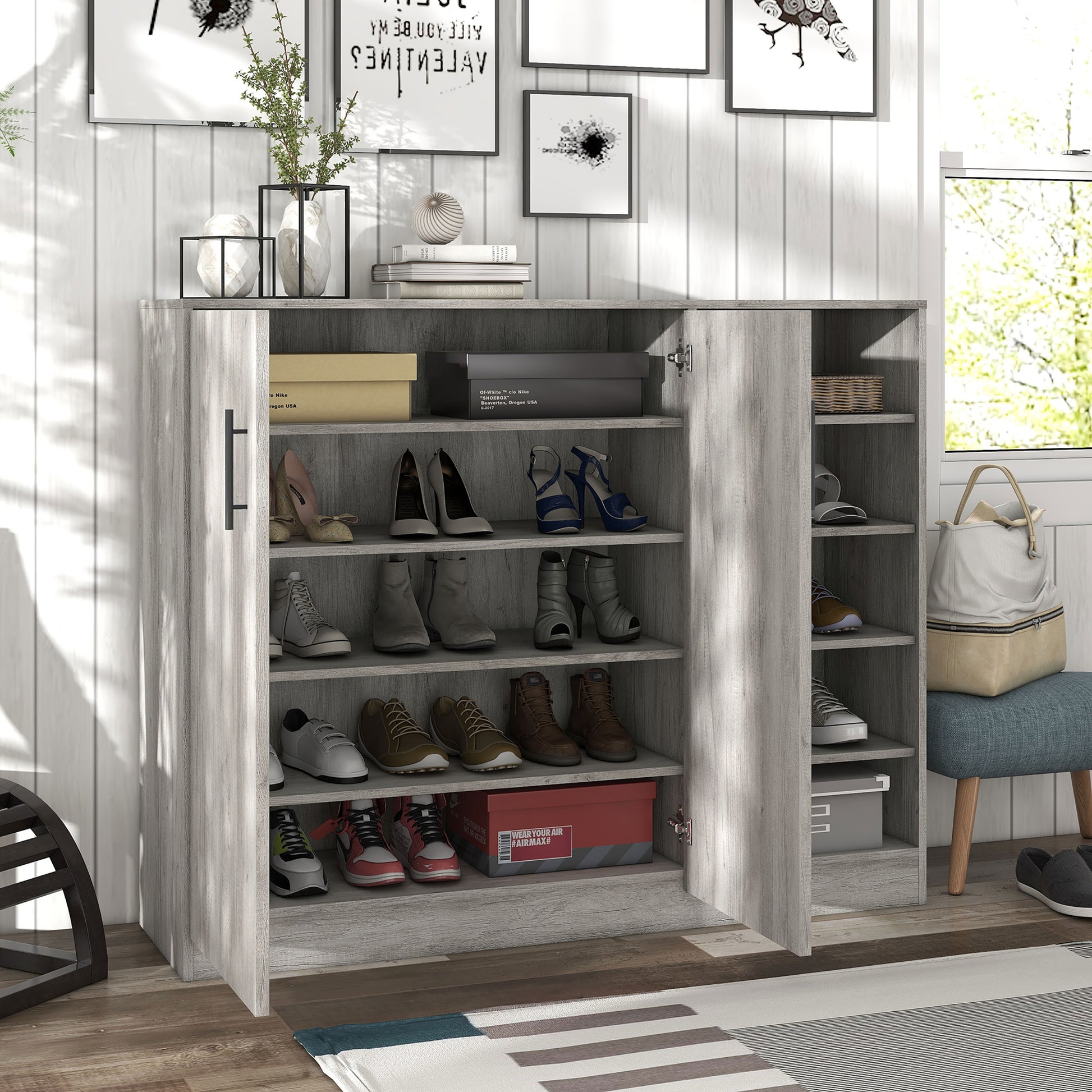 Right angled farmhouse vintage gray oak 10-shelf shoe cabinet with doors open in an entry with accessories