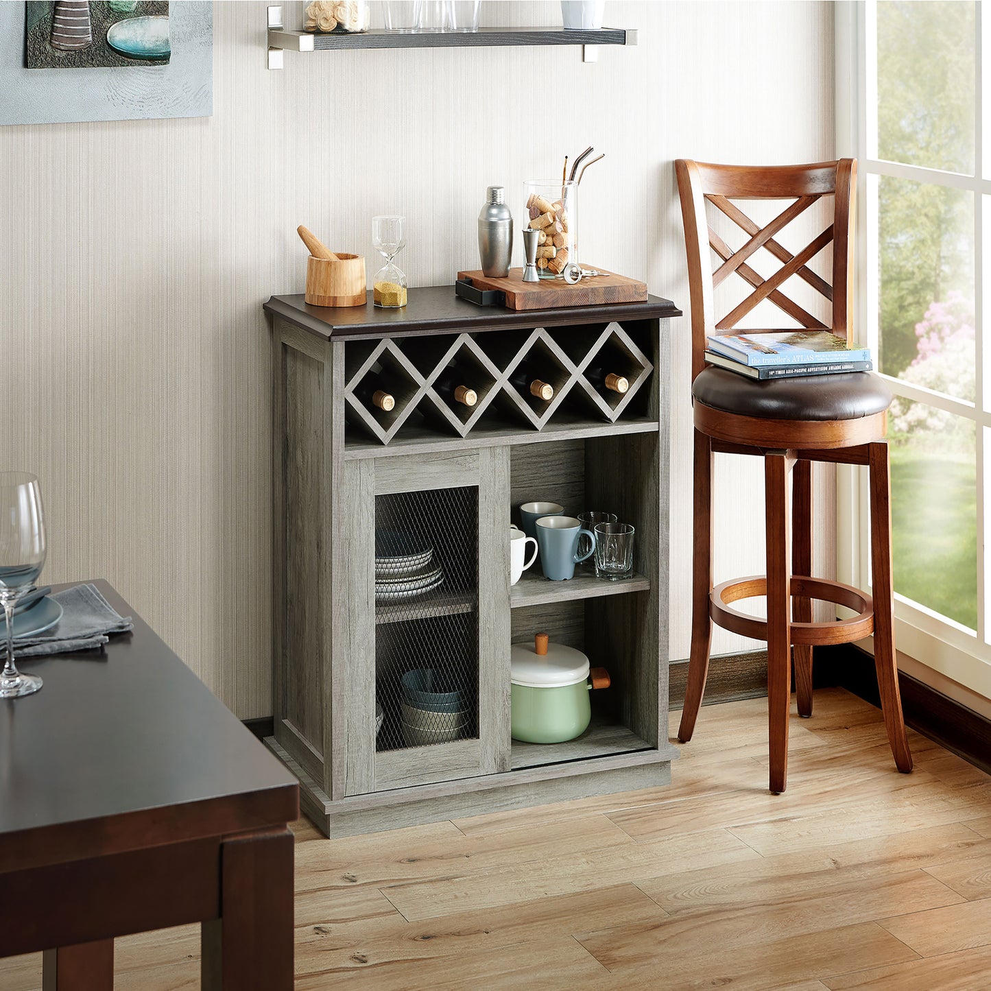 Right angled farmhouse vintage gray oak four-bottle four-shelf wine buffet with a sliding door in a dining room with accessories