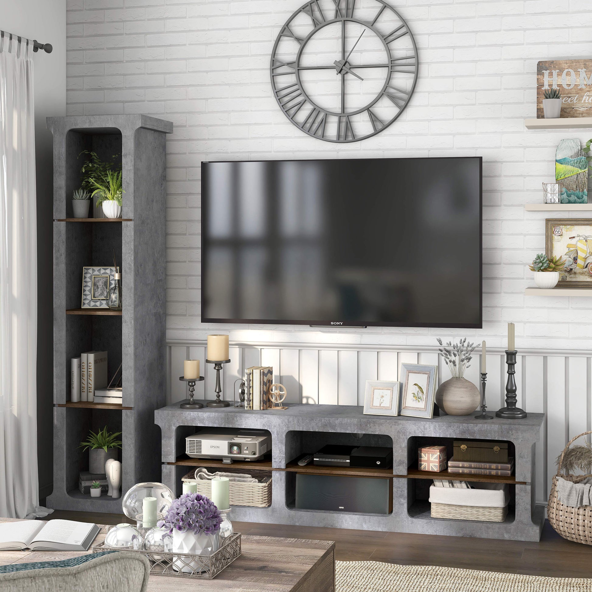 Left angled industrial cement and wood two-piece TV stand and media tower set in a living area with accessories