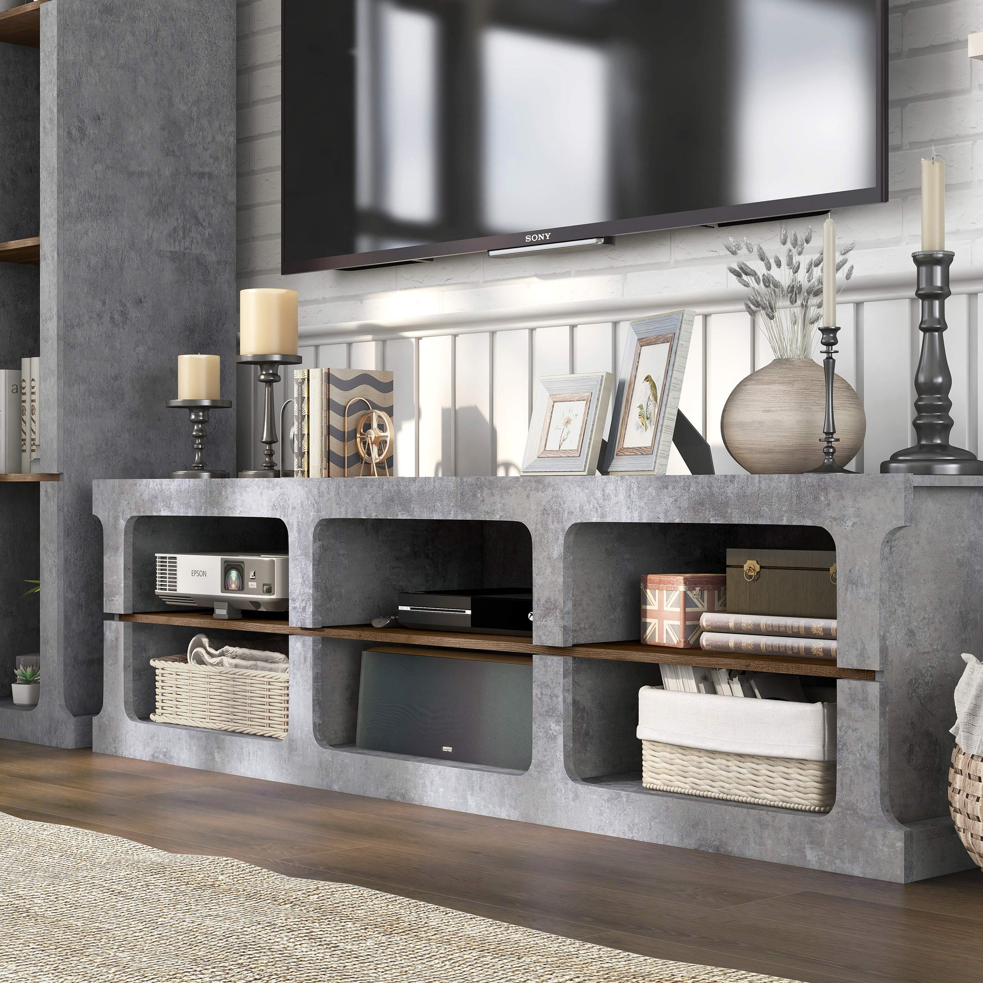 Left angled industrial cement and wood two-piece TV stand and media tower set in a living area with accessories