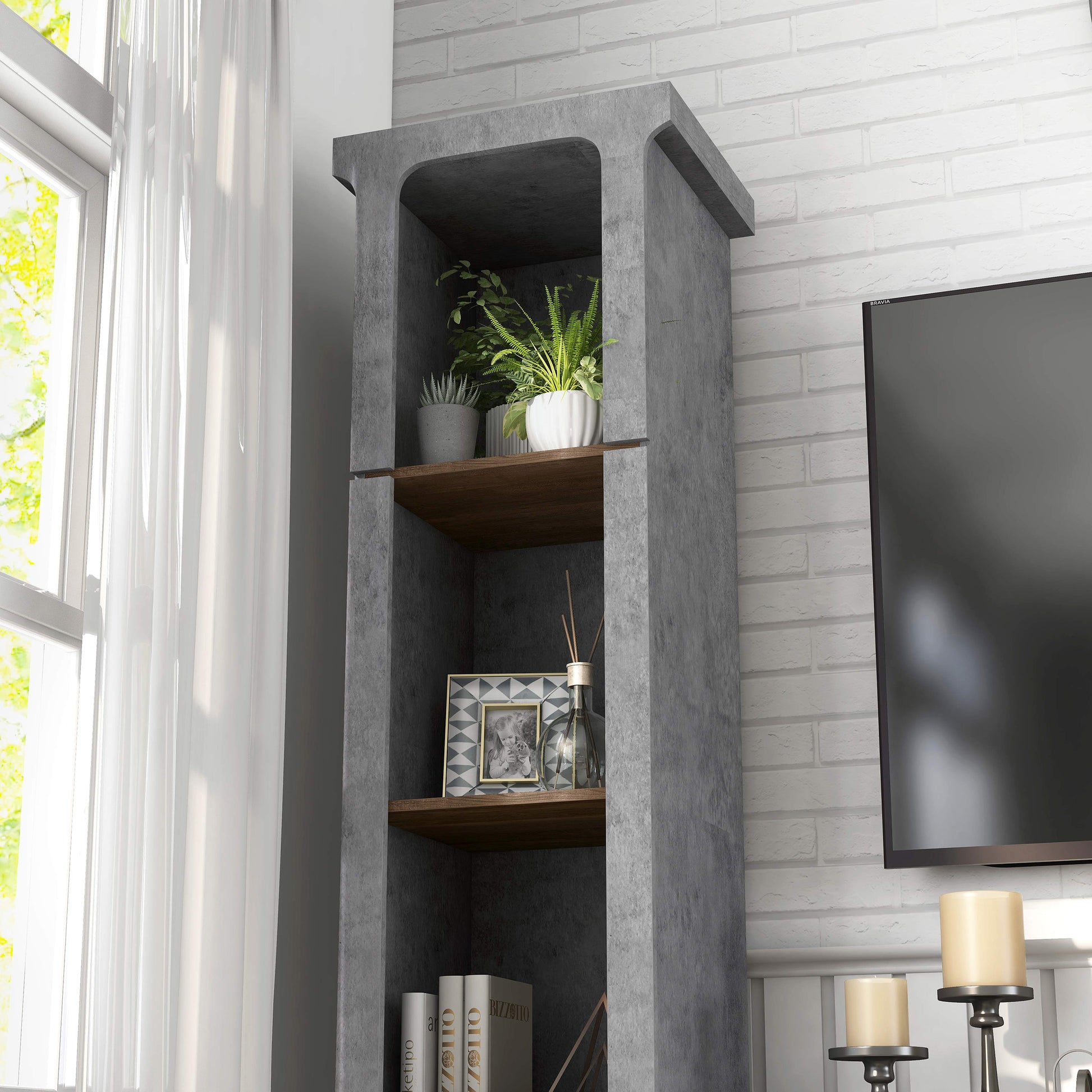 Left angled tower close-up view from an industrial cement and wood two-piece TV stand and media tower set in a living area with accessories