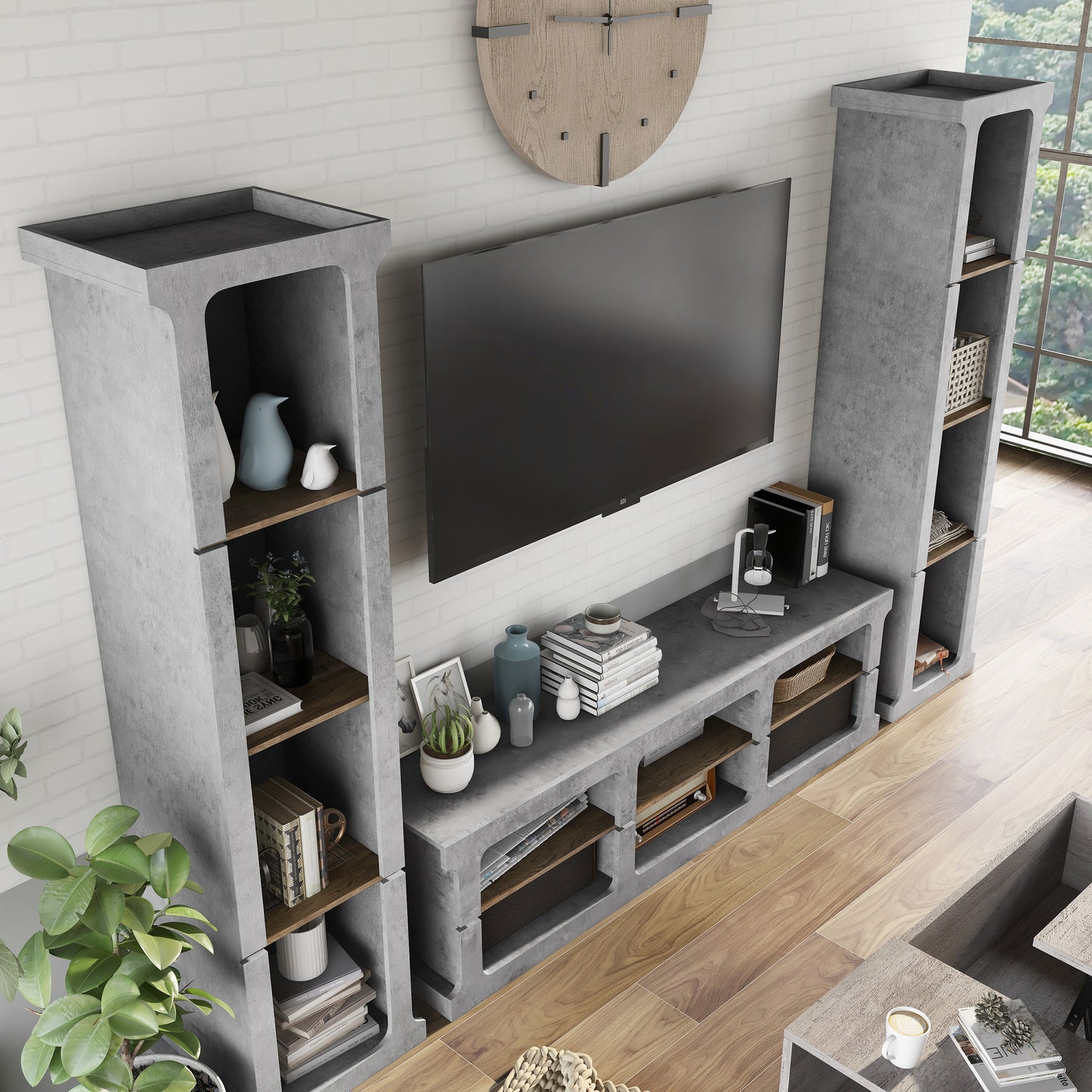 Right angled bird's eye view of an industrial cement and wood three-piece TV stand and media tower set in a living area with accessories