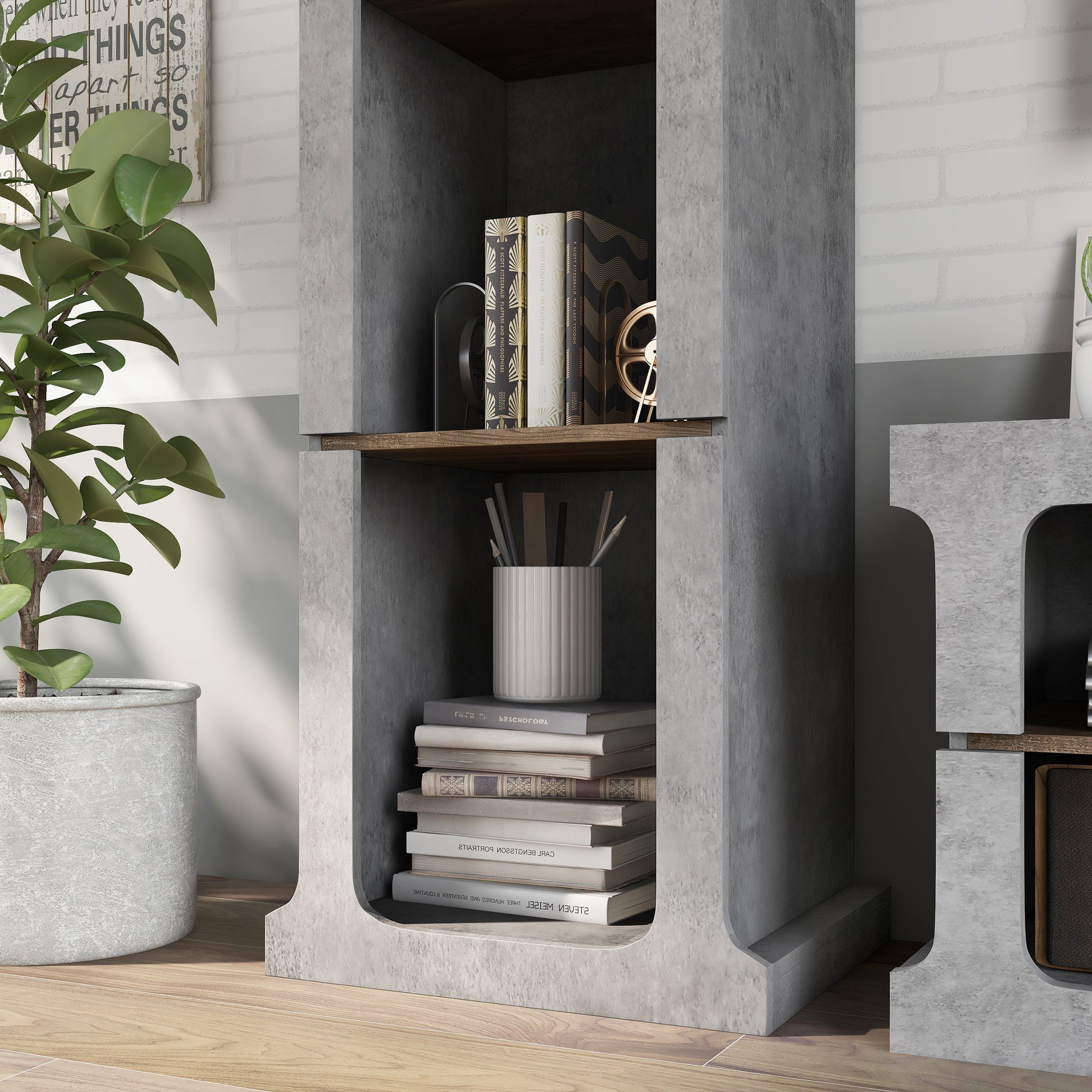 Left angled tower only close-up lower shelf view from an industrial cement and wood three-piece TV stand and media tower set in a living area with accessories