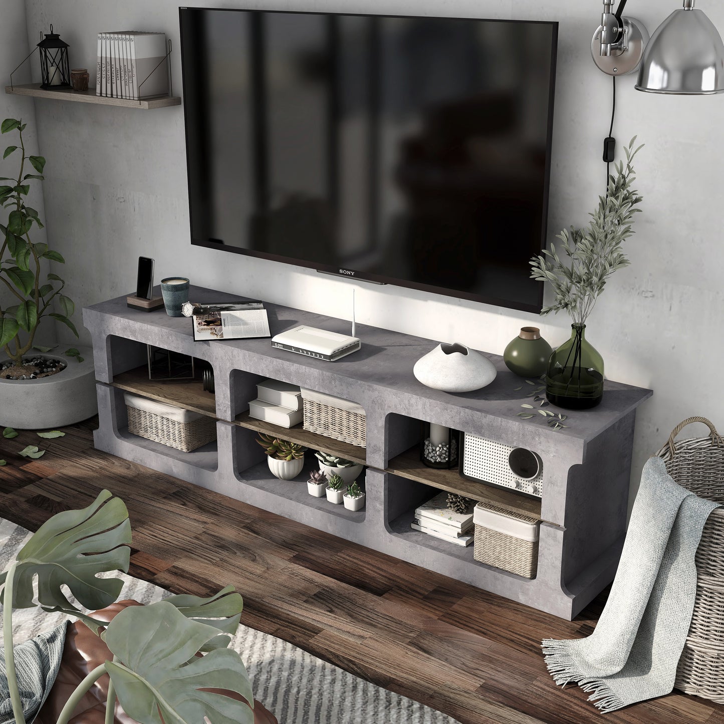 Left angled bird's view of an industrial cement and wood six-shelf TV stand in a living area with accessories