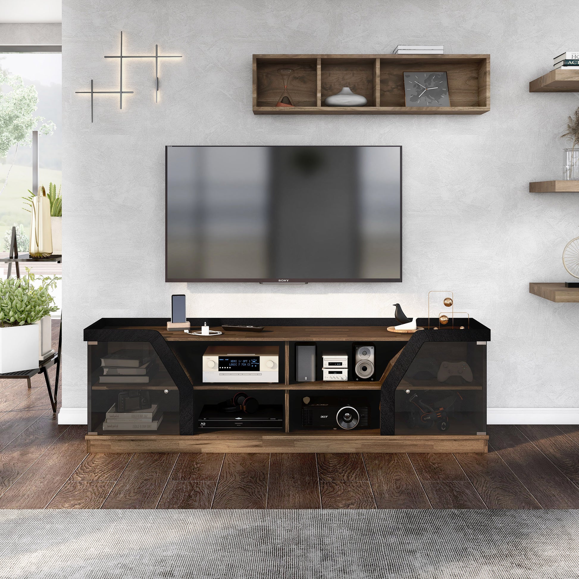 Front-facing contemporary light hickory and black glass multi-shelf TV console in a living room with accessories
