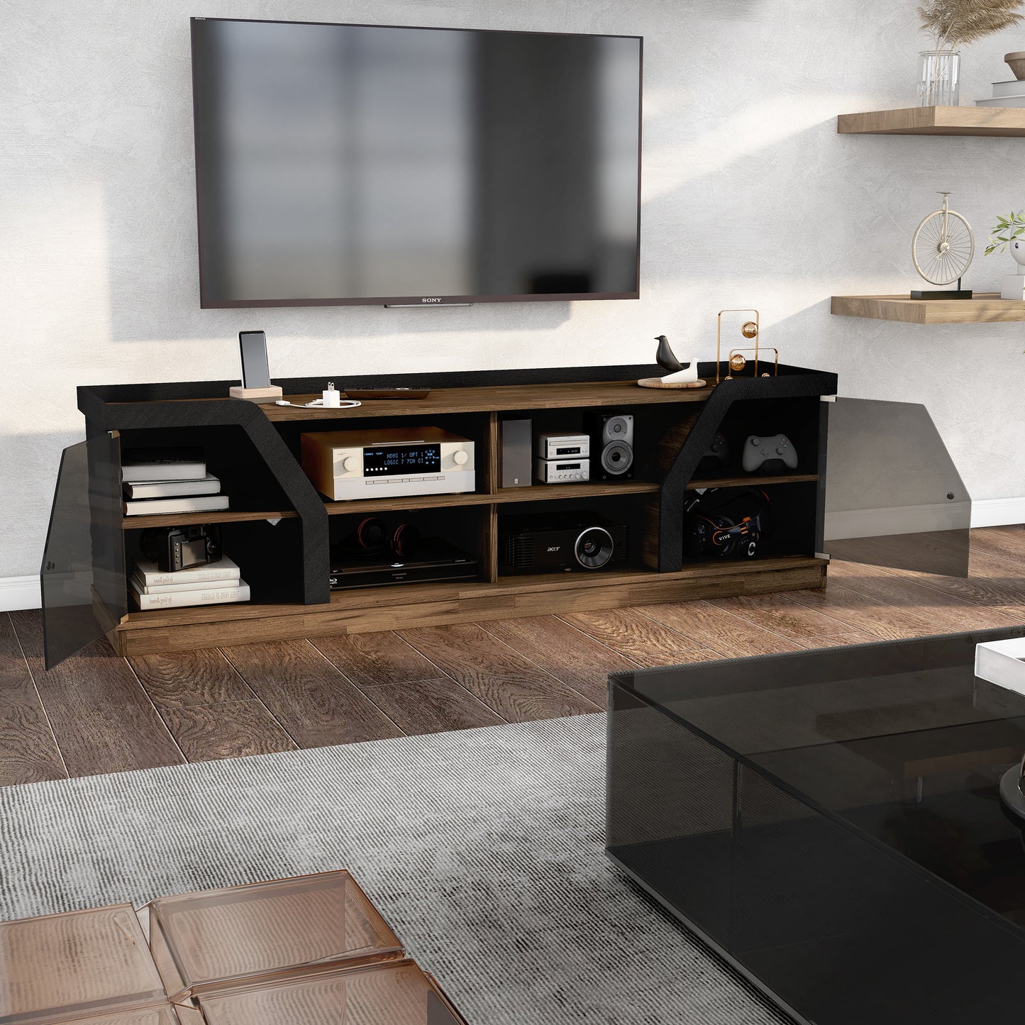 Right angled contemporary light hickory and black glass multi-shelf TV console with doors open in a living room with accessories