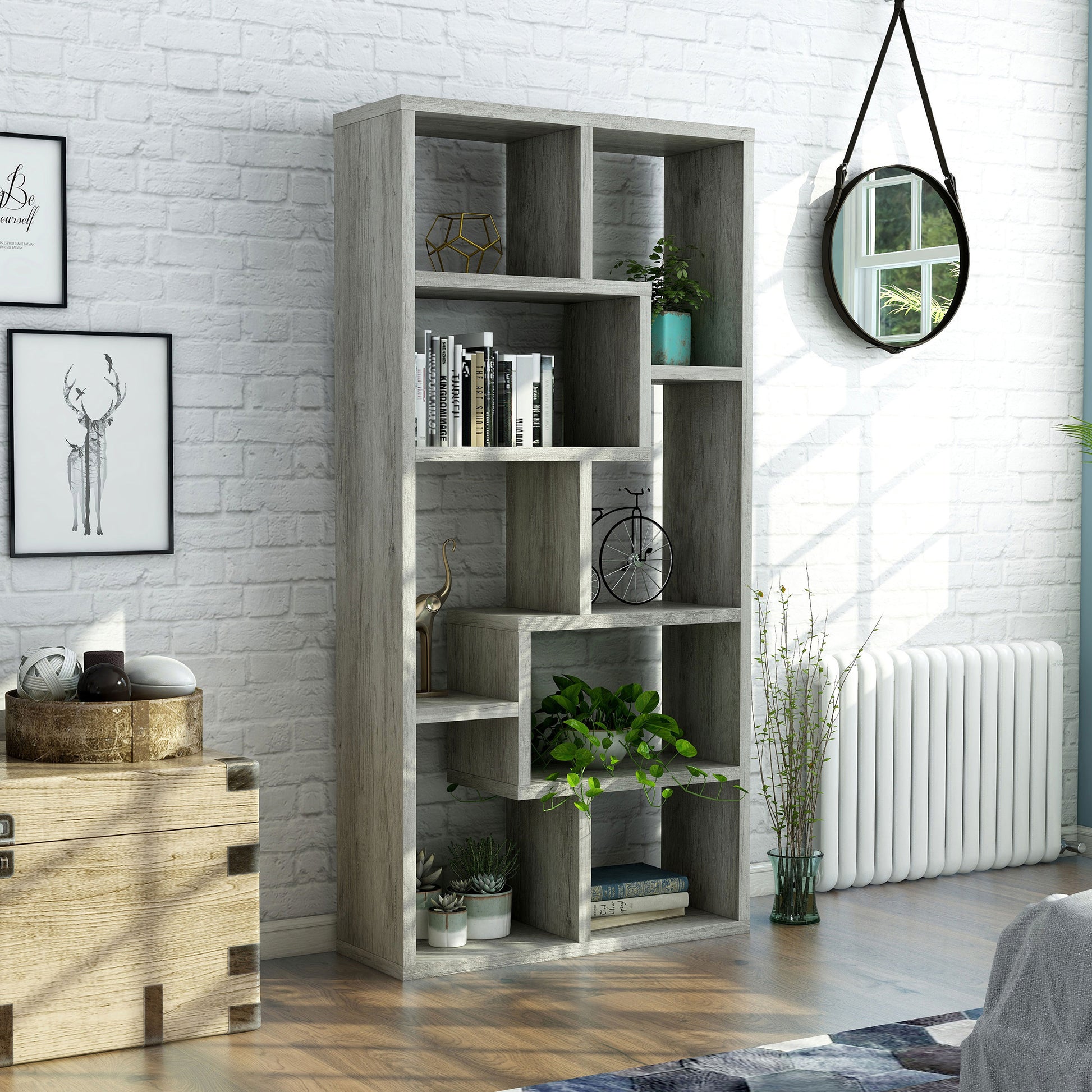 Right angled modern vintage gray oak open geometric bookcase in a living area with accessories