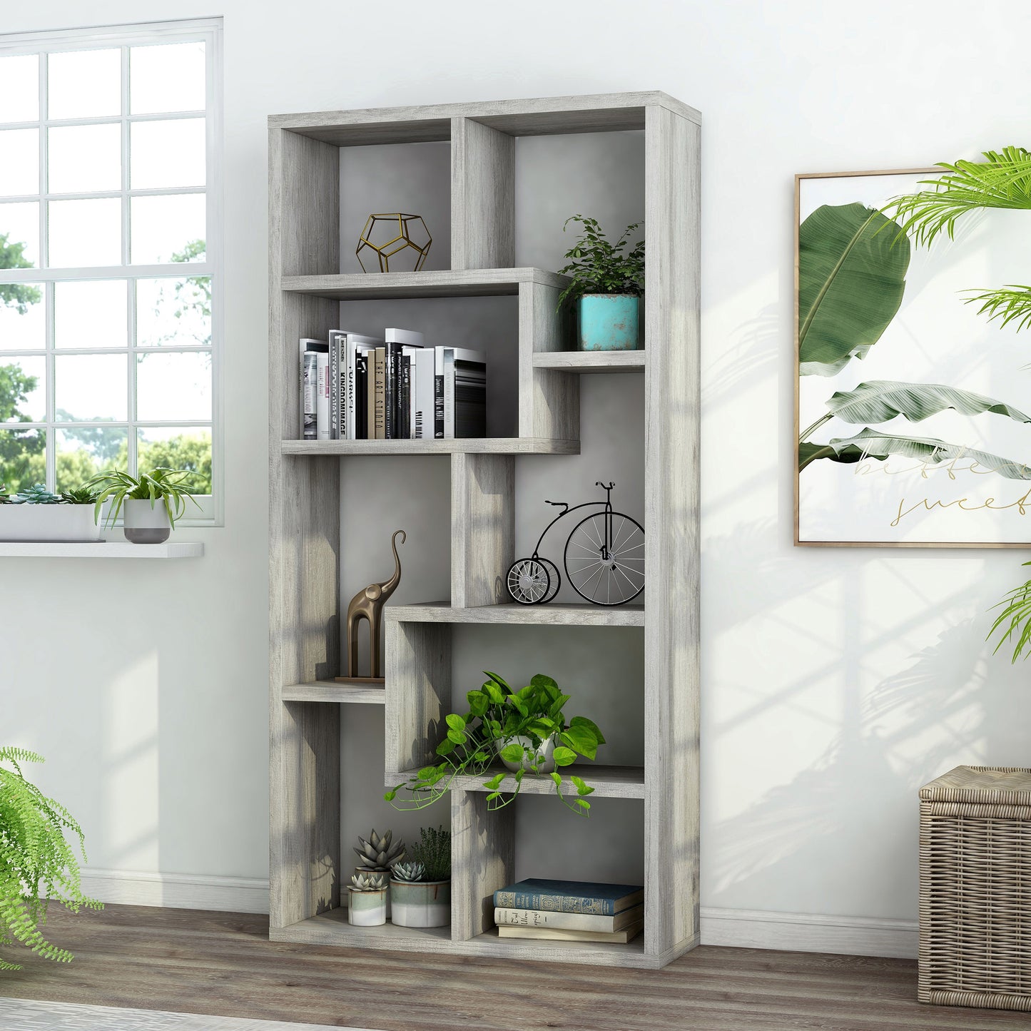 Left angled modern vintage gray oak open geometric bookcase in a living area with accessories