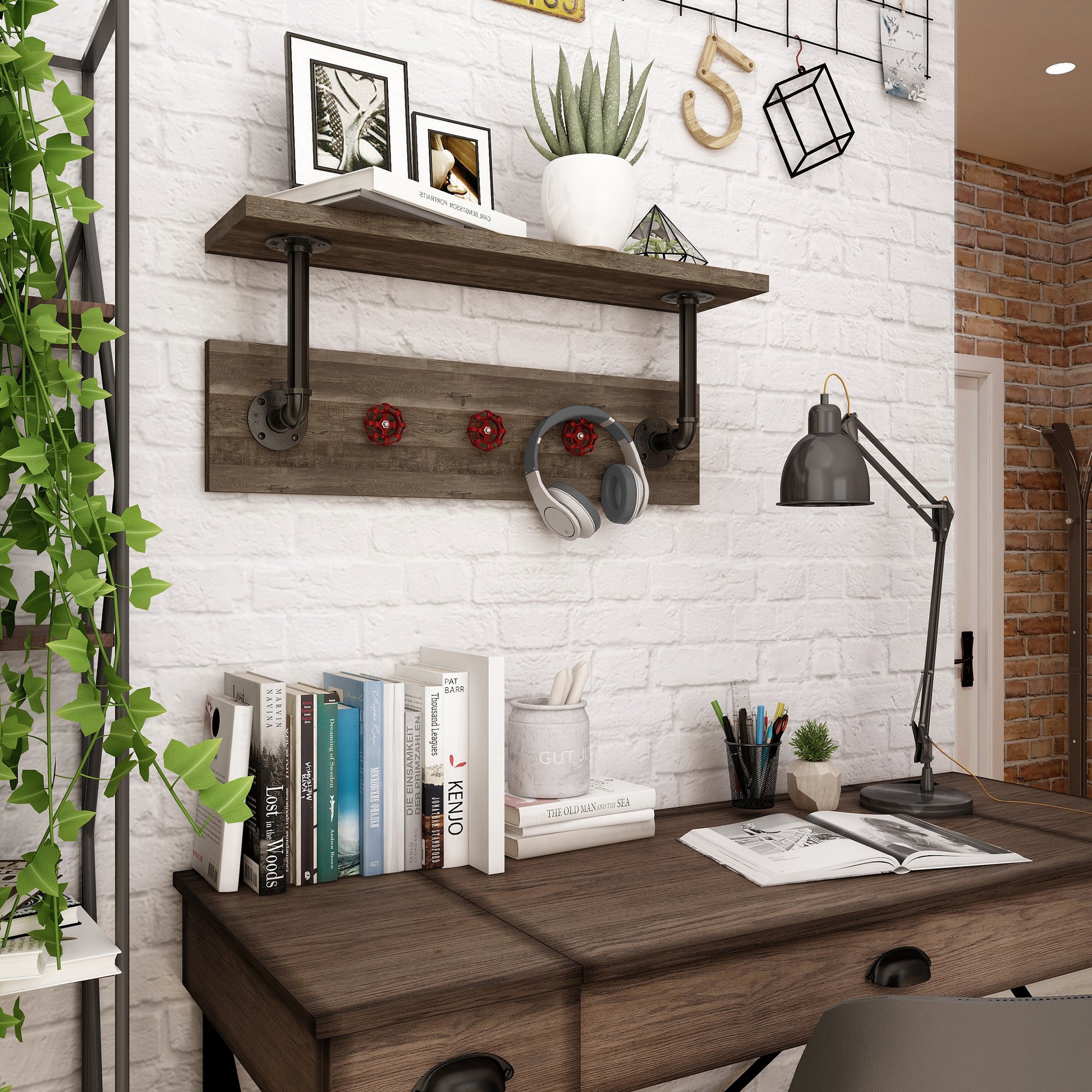 Right angled industrial reclaimed oak and water pipe wall shelf with red valve hooks in a home office with accessories