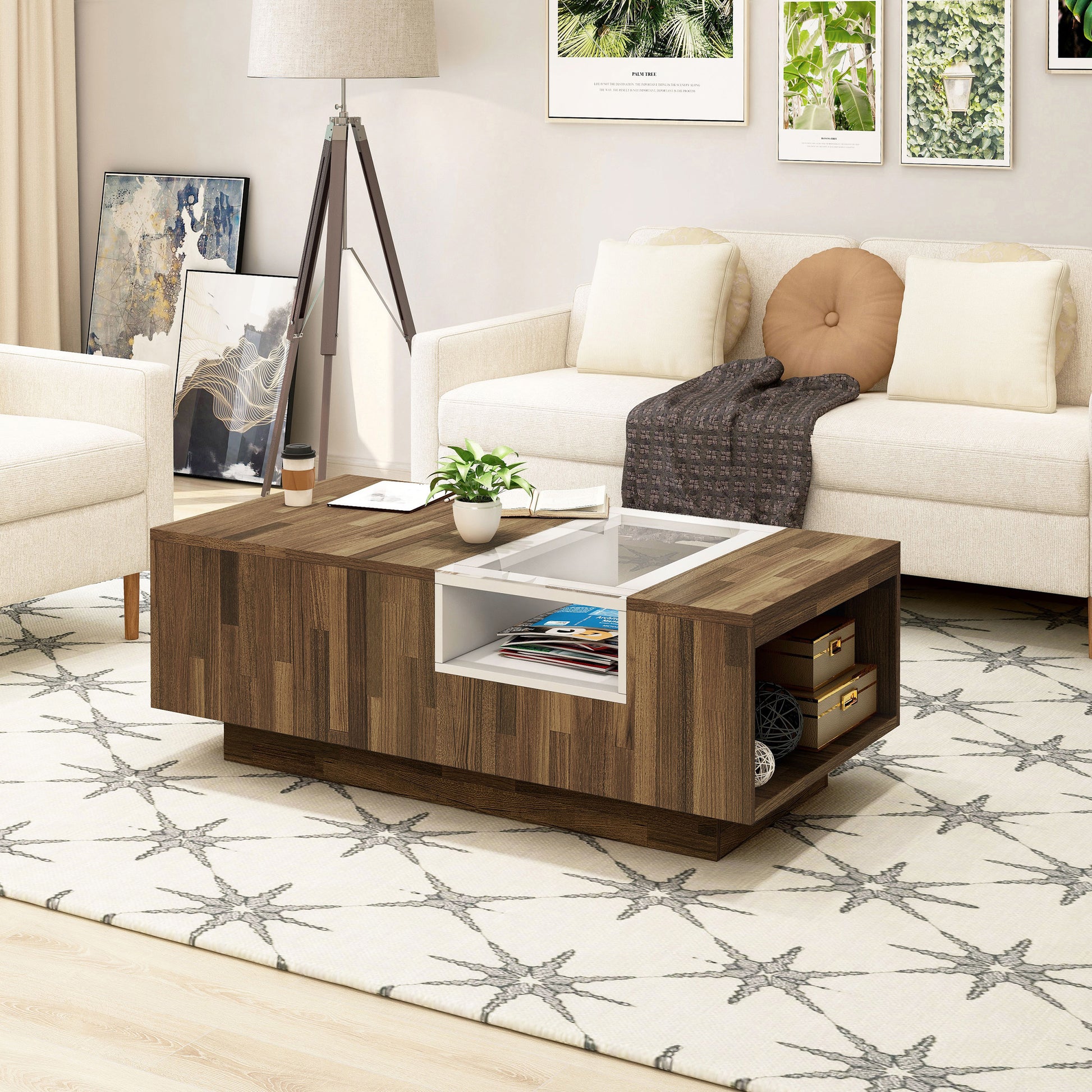 Left angled modern light hickory and white three-shelf coffee table in a living room with accessories