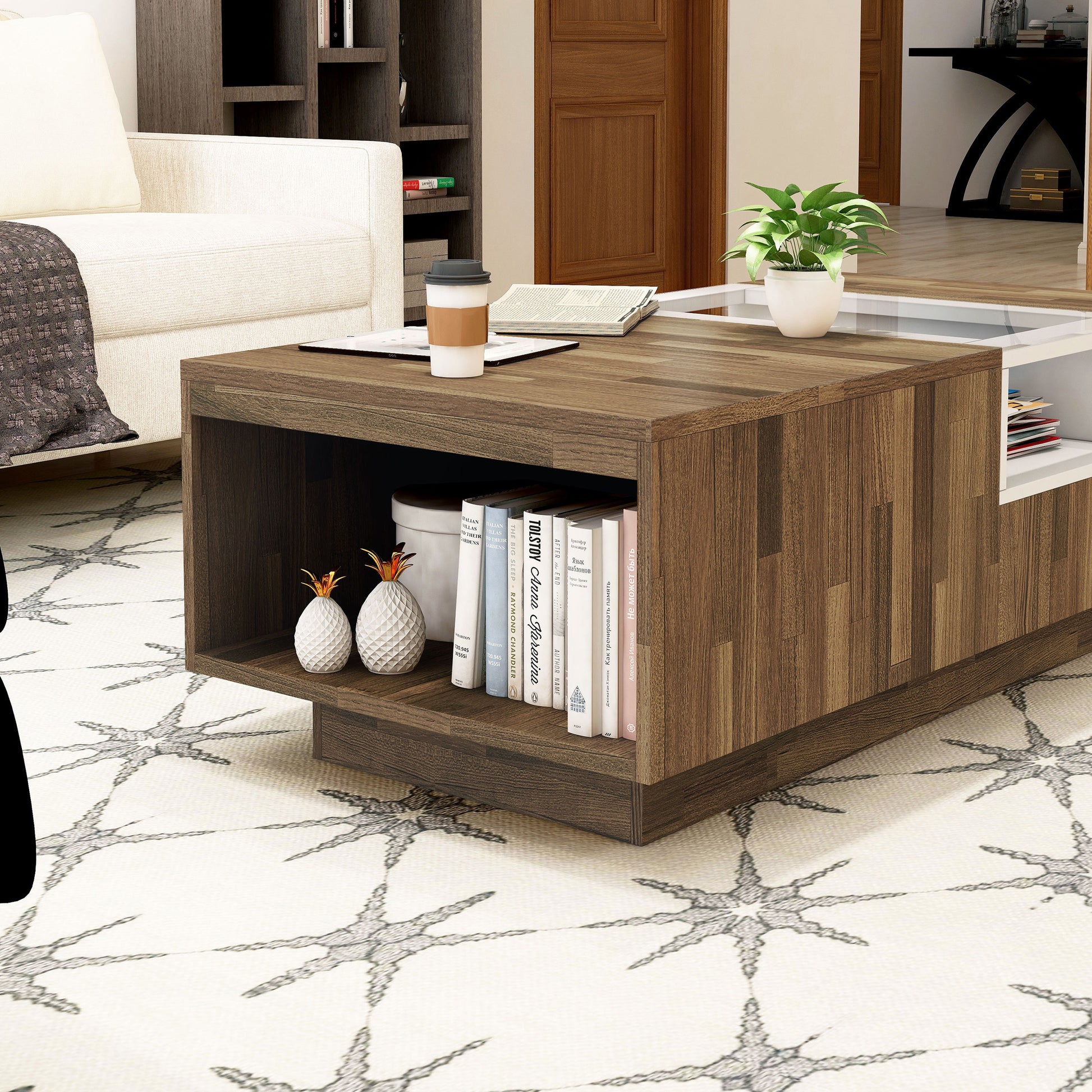 Right angled end shelf close-up view of a modern light hickory and white three-shelf coffee table in a living room with accessories