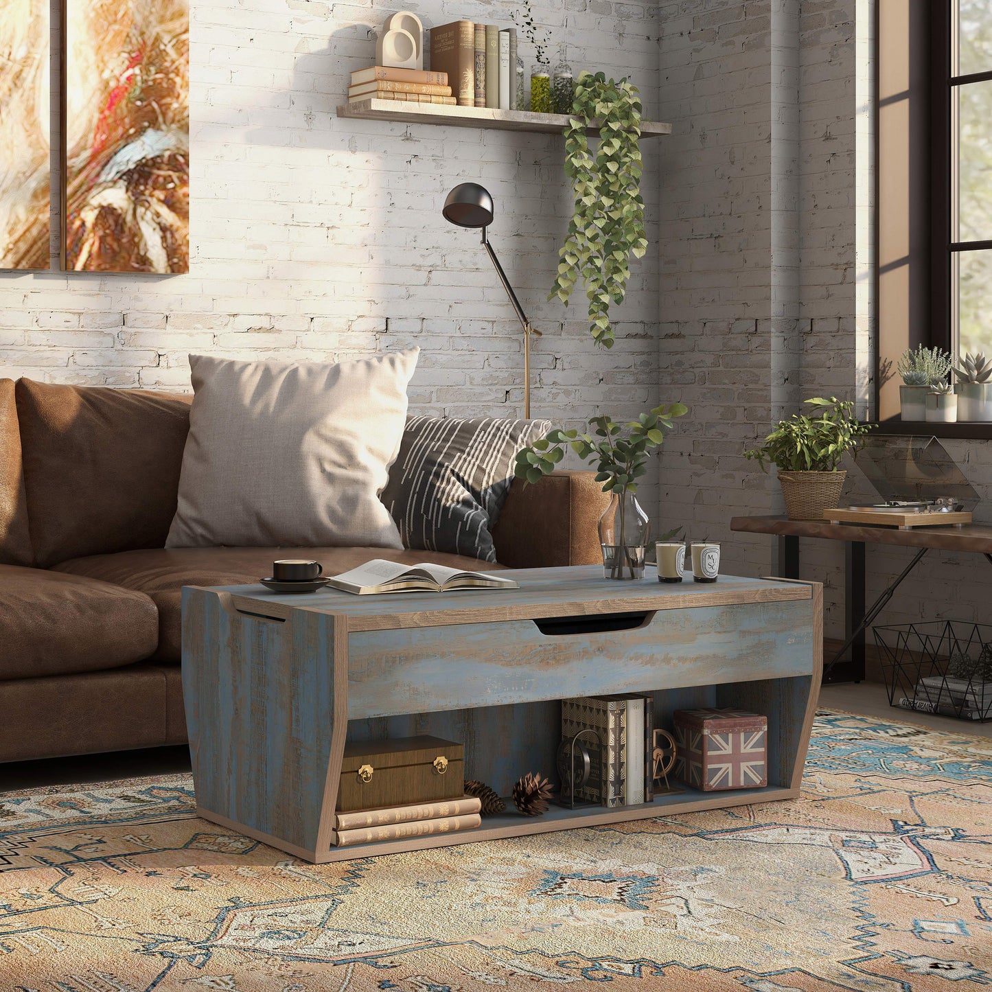 Right angled rustic distressed blue lift-top storage coffee table in a living room with accessories