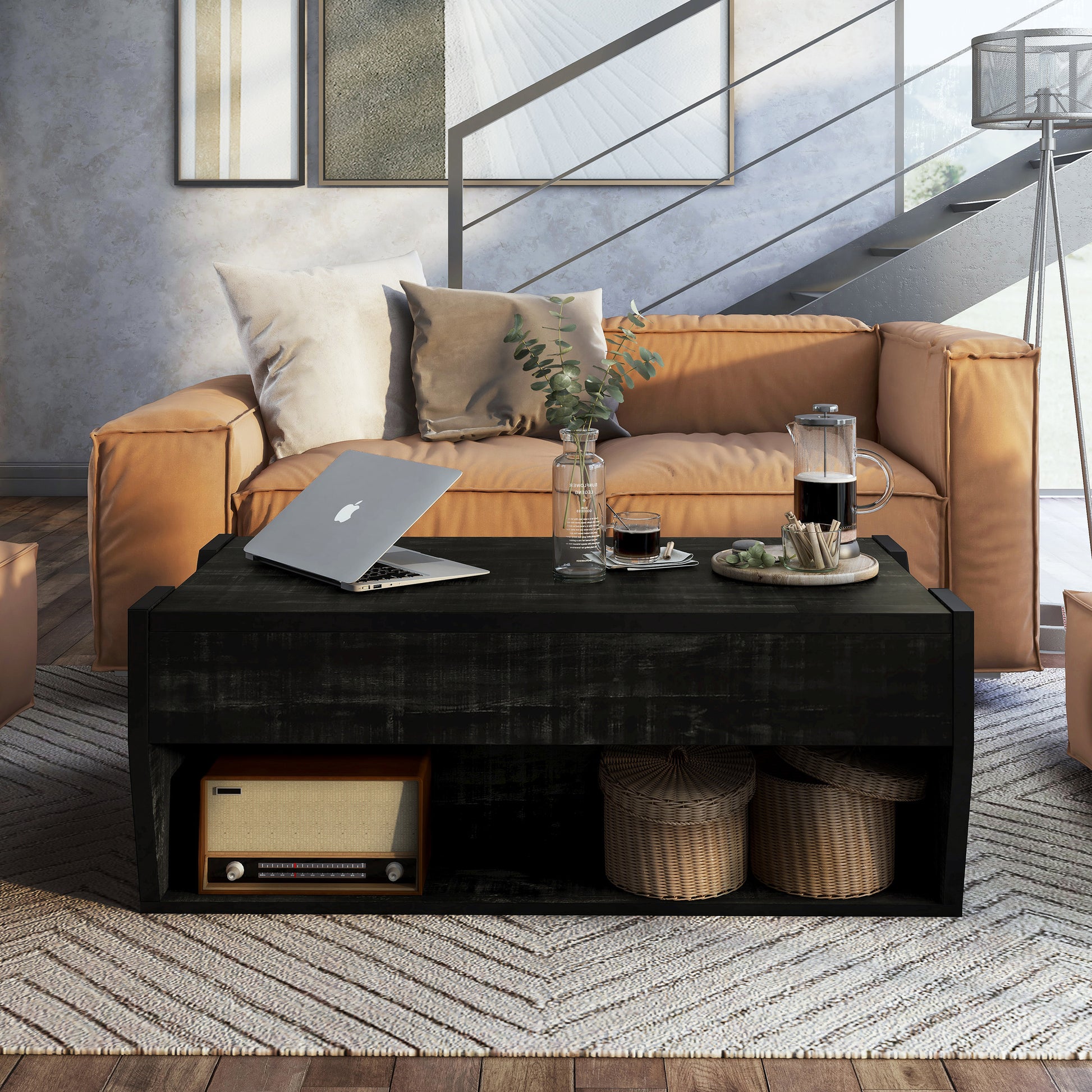 Front-facing rustic reclaimed black lift-top storage coffee table in a living room with accessories