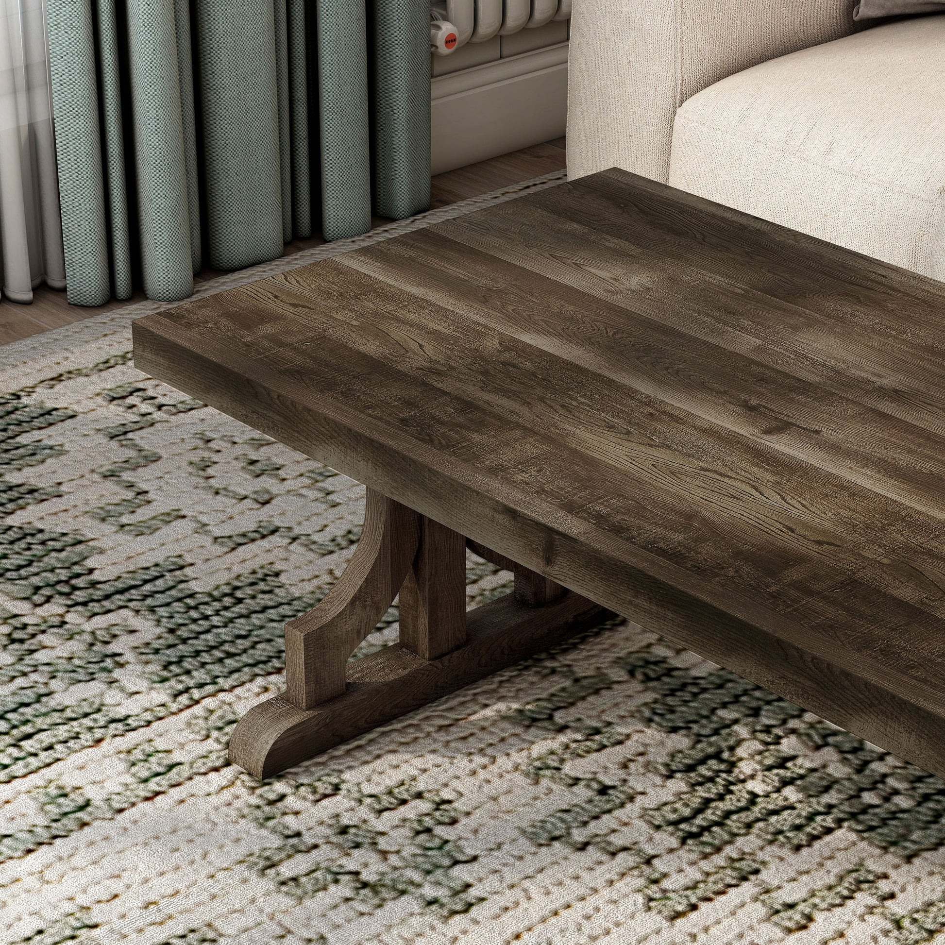 Left angled close-up view of a farmhouse reclaimed oak trestle base coffee table in a living room