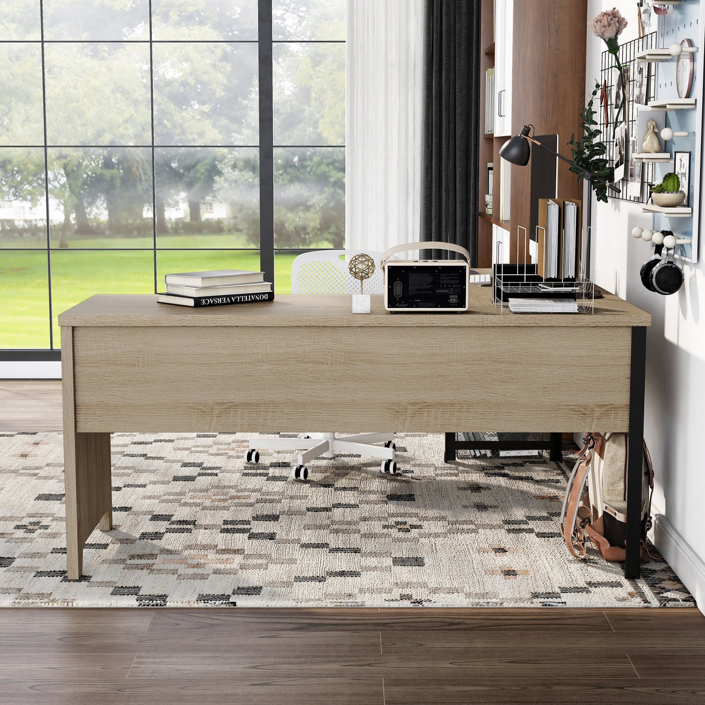 Front-facing back/side view of an industrial natural oak and black mesh L-shaped corner desk with a lift top in a home office with accessories