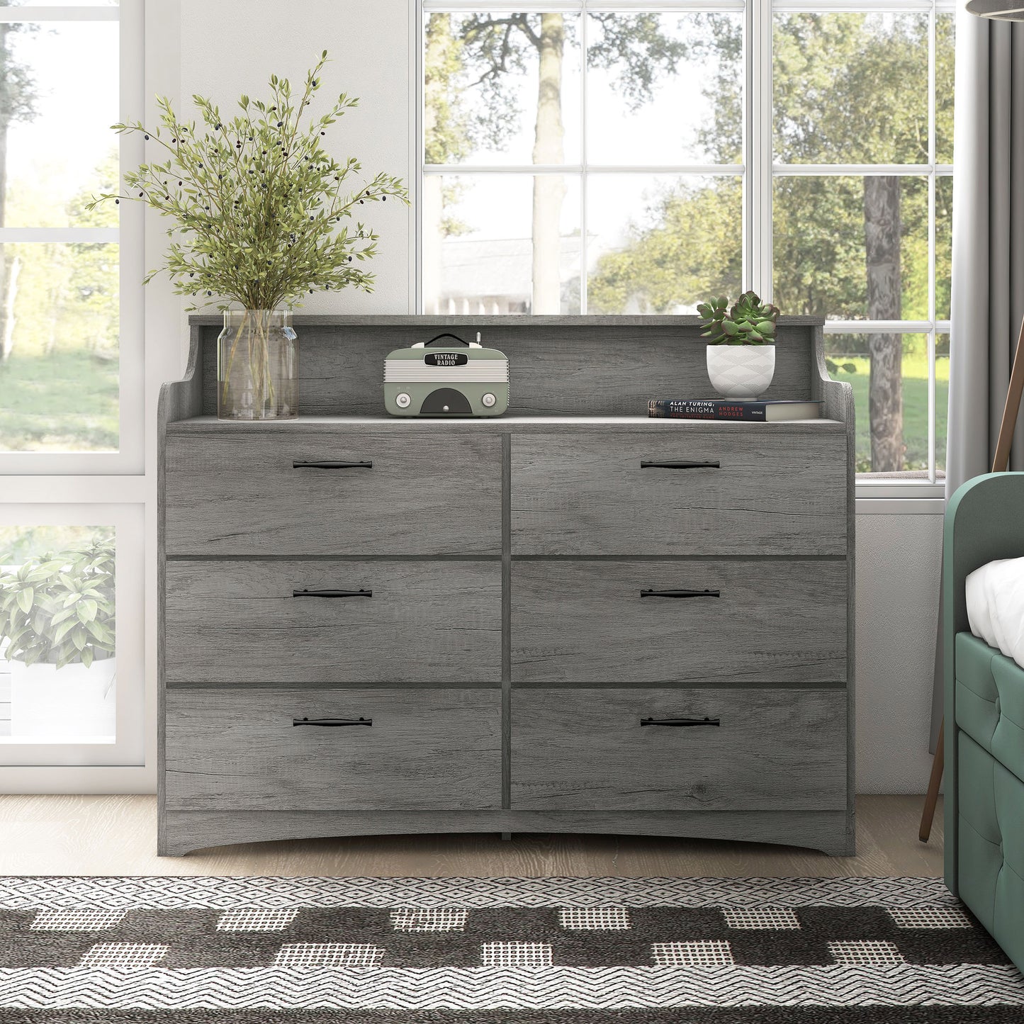 Front-facing transitional vintage gray oak six-drawer double dresser with a tiered top in a bedroom with accessories