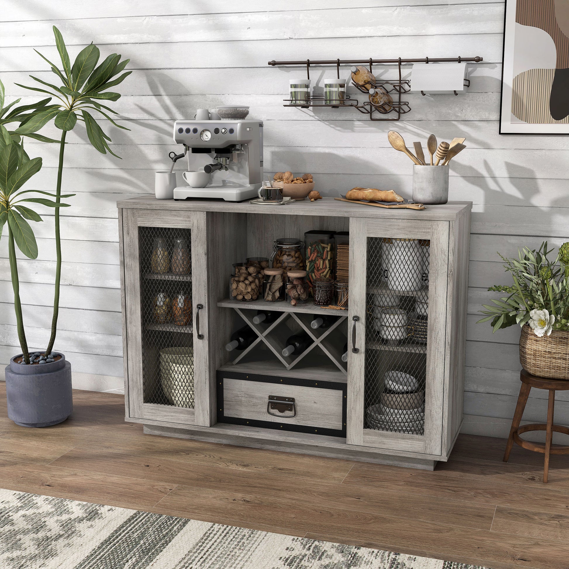 Left angled farmhouse vintage gray oak six-shelf wine storage buffet with black mesh doors in a dining room with accessories