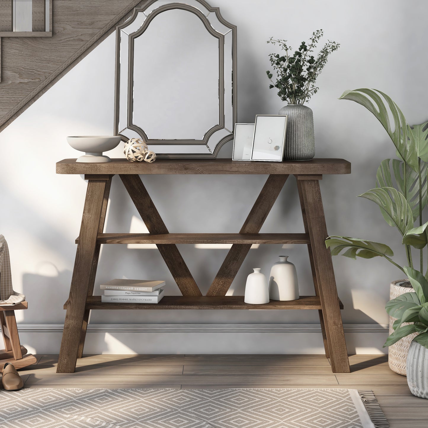 Front-facing farmhouse reclaimed oak two-shelf console table in a living area with accessories