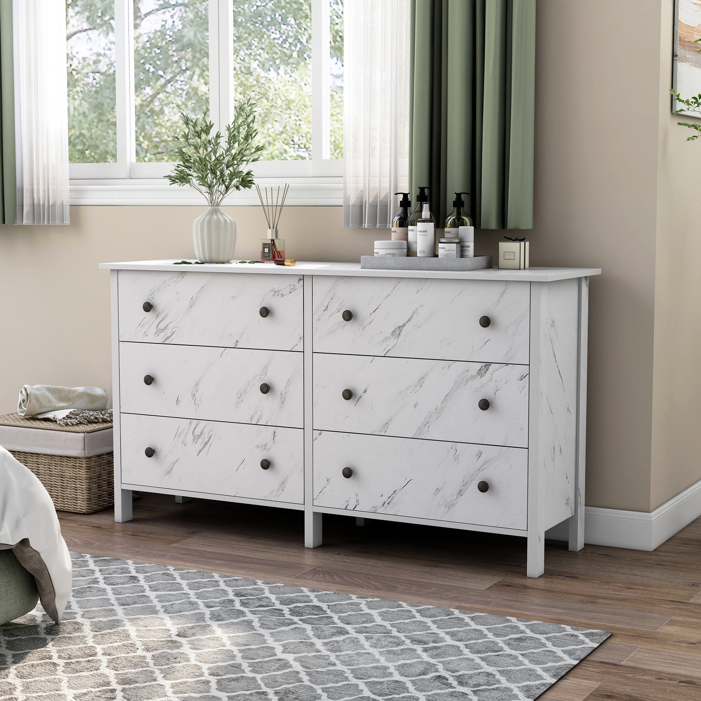 Left angled transitional white faux marble six-drawer double dresser in a bedroom with accessories