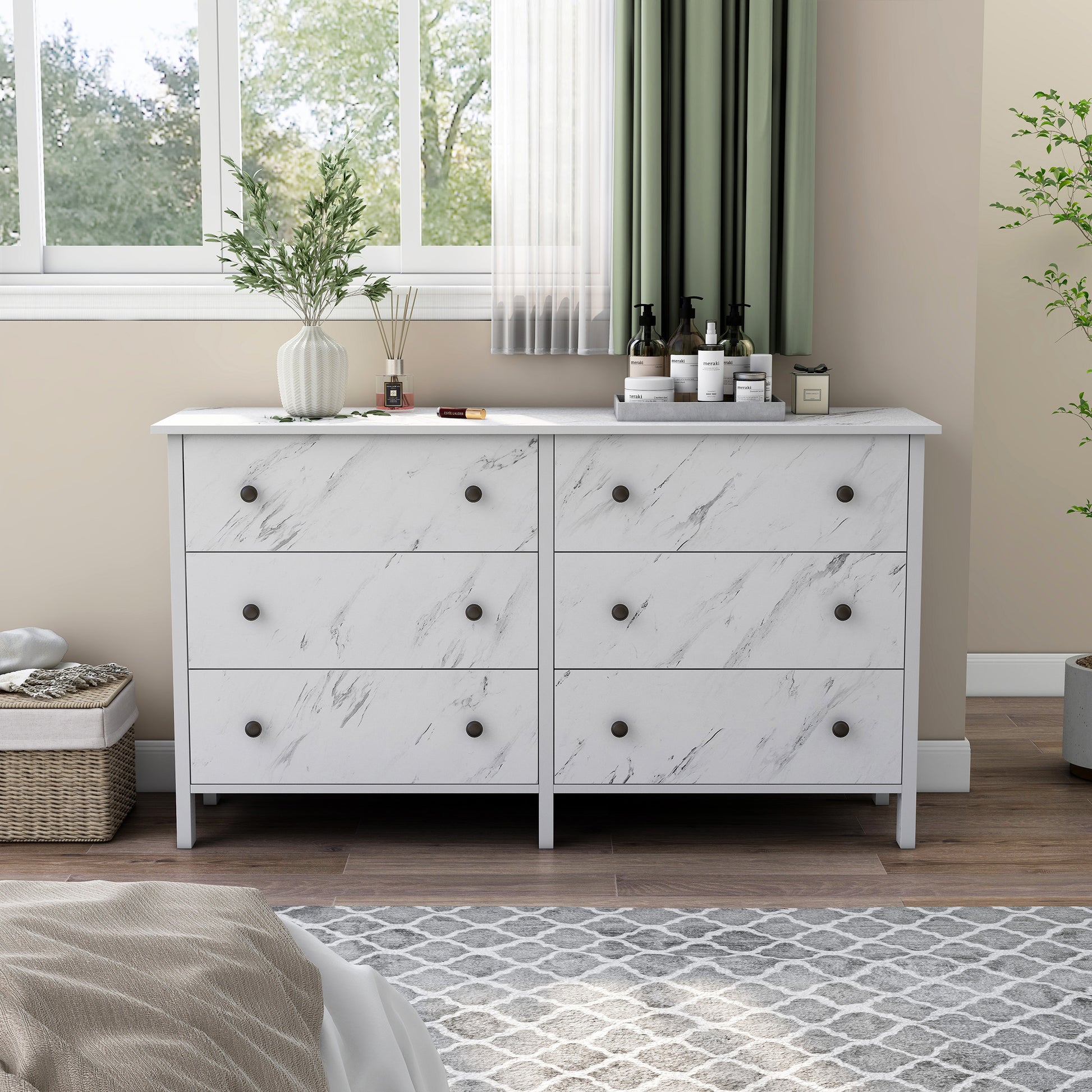 Front-facing transitional white faux marble six-drawer double dresser in a bedroom with accessories