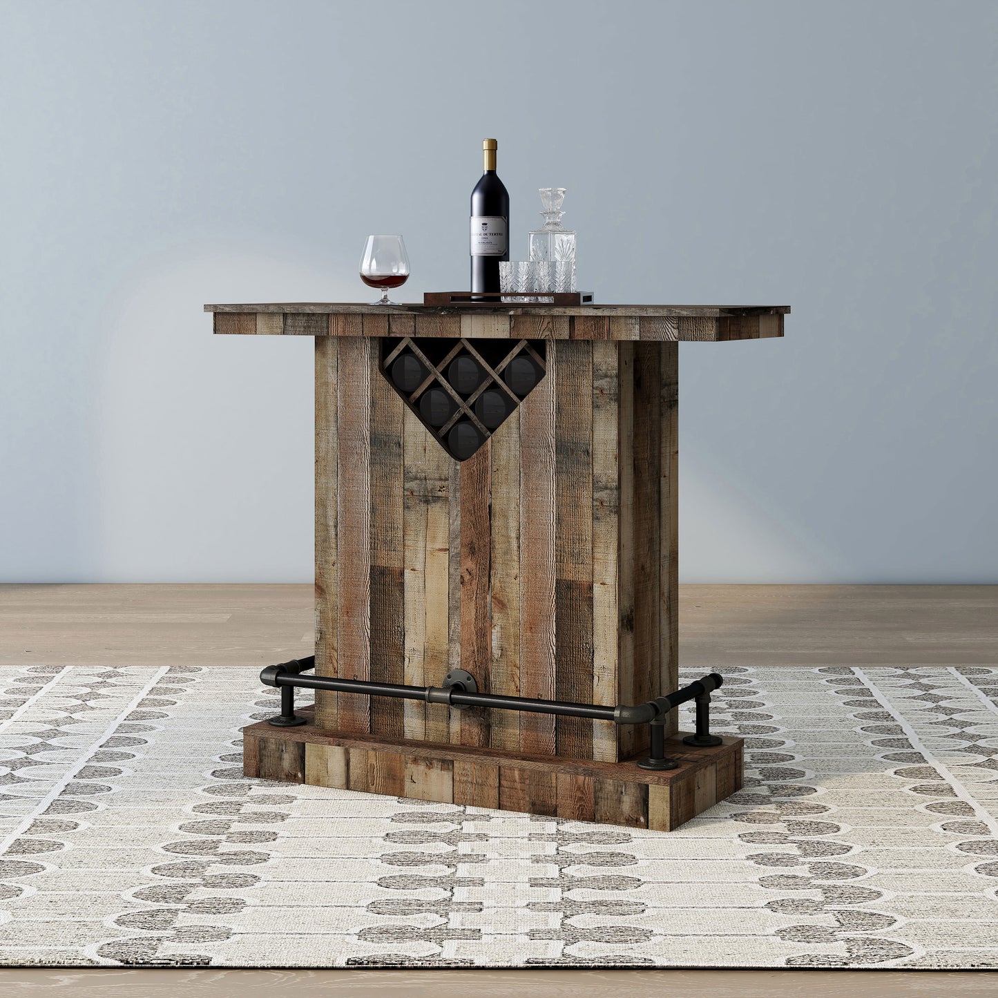 Left angled back view of a farmhouse reclaimed barnwood eight-bottle home bar with a footrest on an area rug