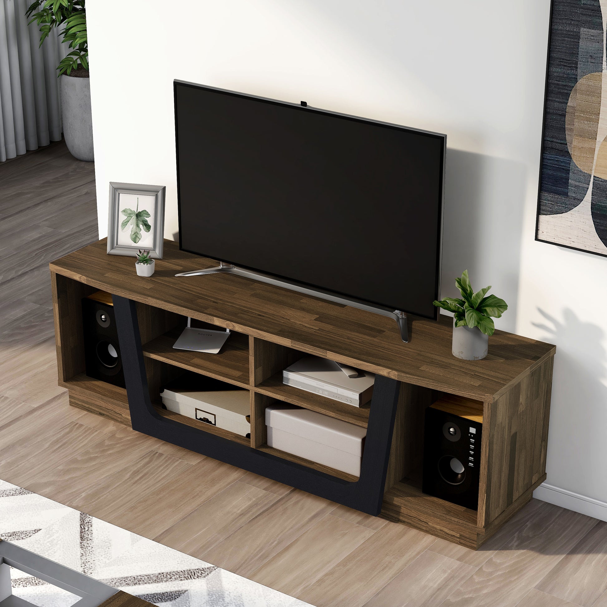 Left angled bird's eye view of a contemporary light hickory and black six-shelf TV stand in a living room with accessories