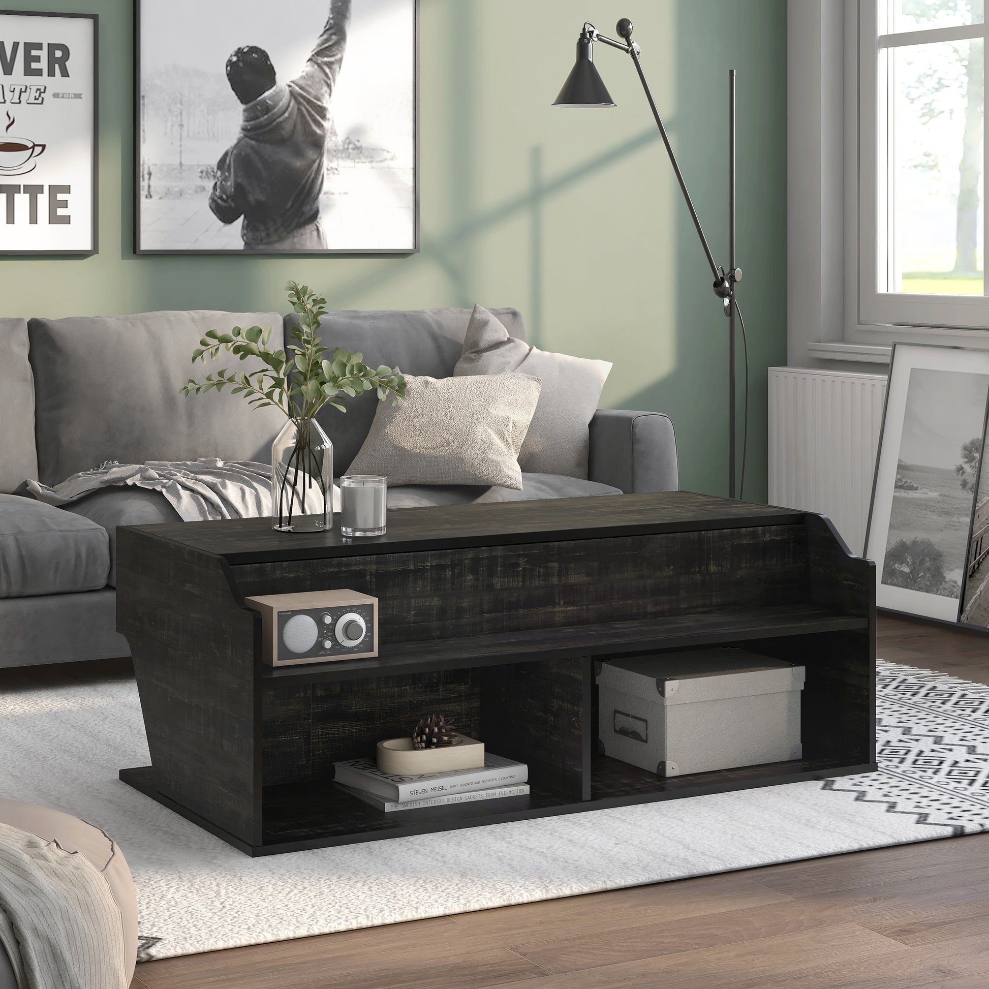 Right angled transitional reclaimed black oak lift-top coffee table with storage in a living room with accessories