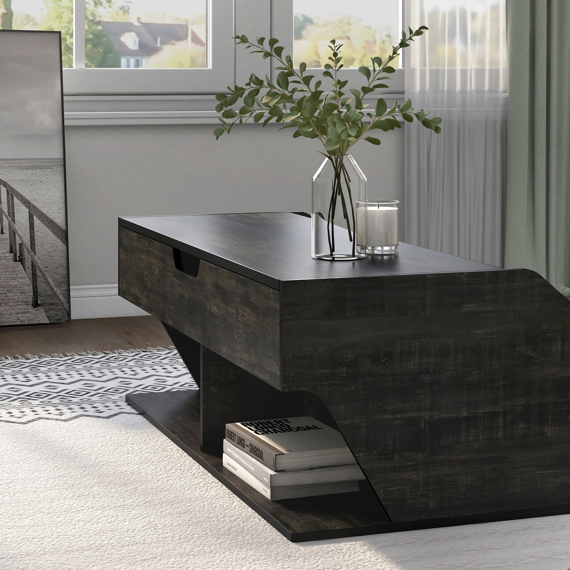 Left angled transitional reclaimed black oak lift-top coffee table with storage in a living room with accessories