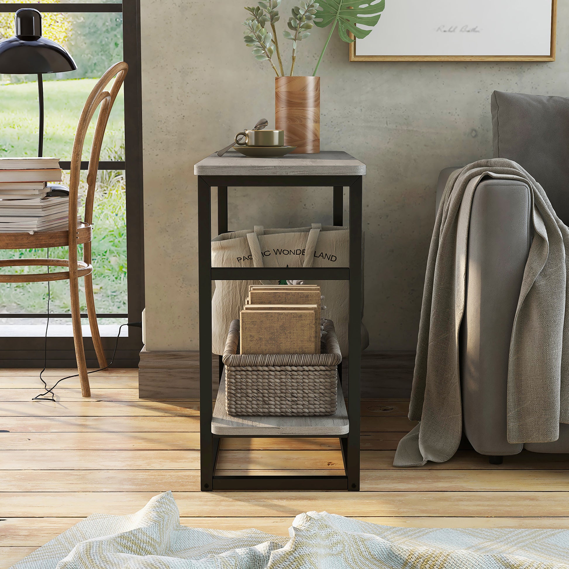 Front-facing industrial vintage gray oak one-shelf long side table in a living room with accessories