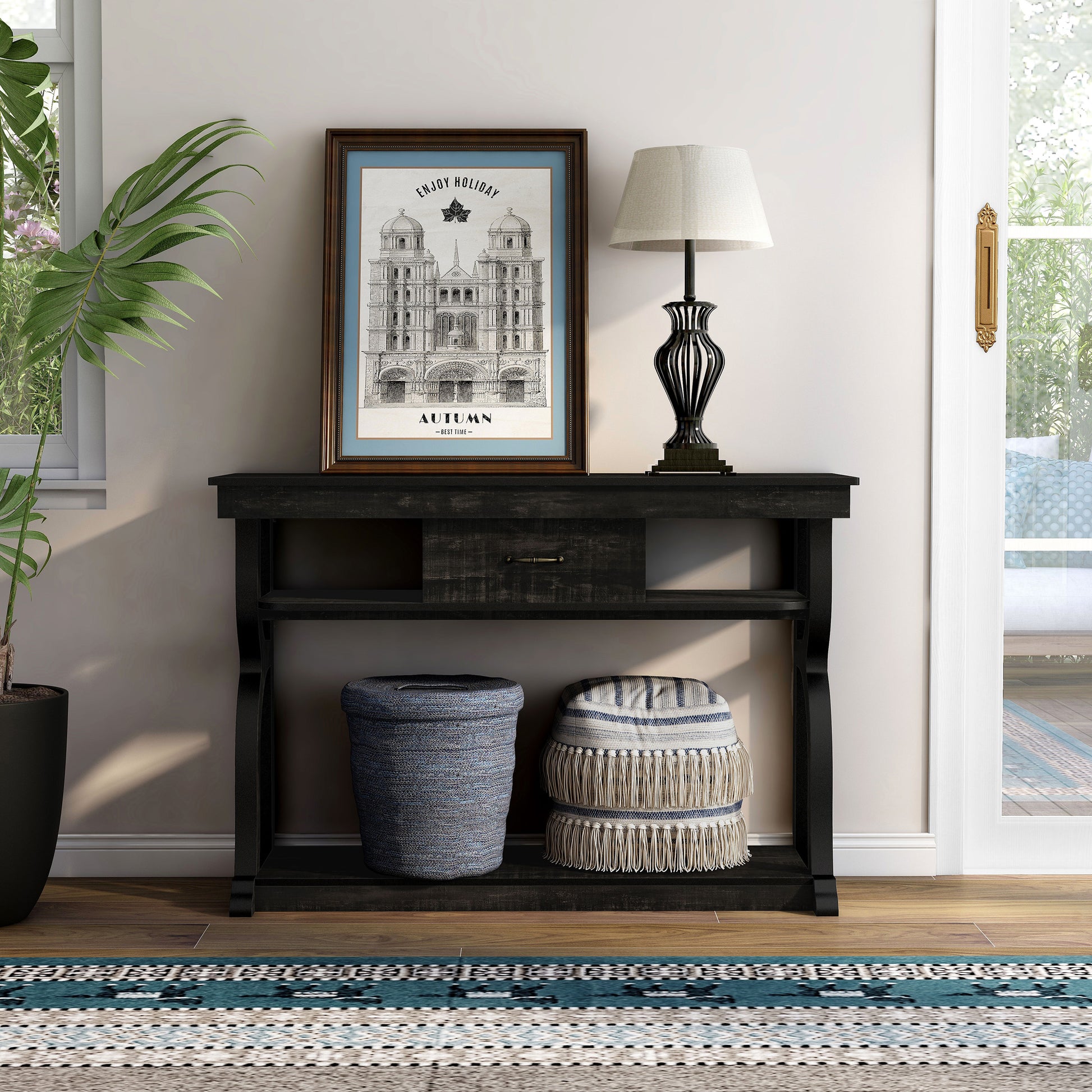 Front-facing farmhouse reclaimed black oak three-shelf storage console table with a drawer in a living room with accessories