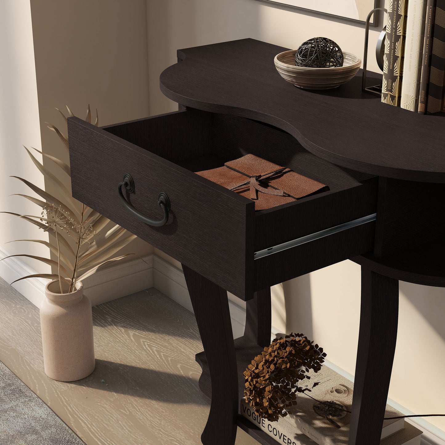 Left angled close -up view of a transitional espresso one-drawer curvy storage console table with drawer open in a living area with accessories