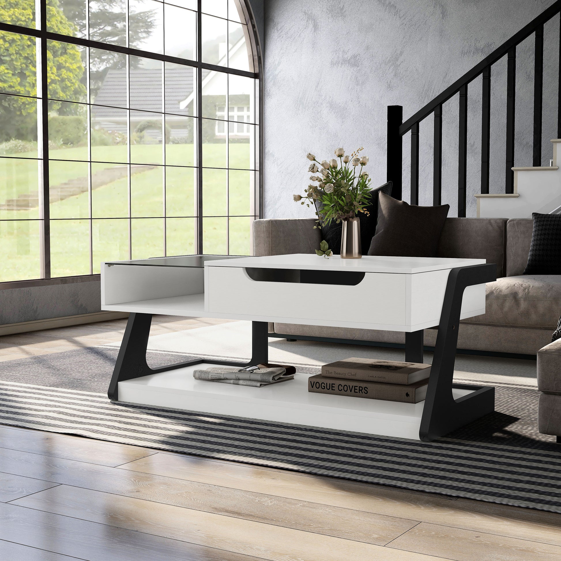 Left angled contemporary white and black lift-top storage coffee table with two shelves in a living room with accessories