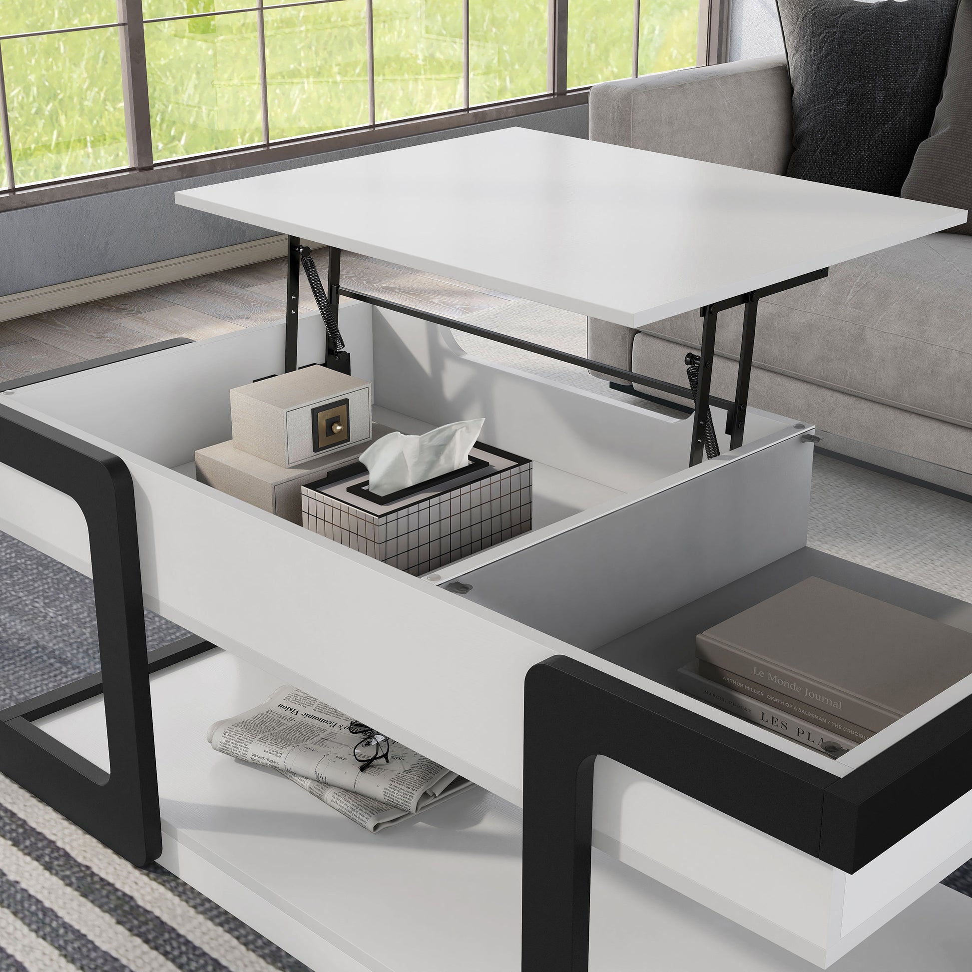 Left angled close-up view of a contemporary white and black lift-top storage coffee table with two shelves and top raised in a living room with accessories