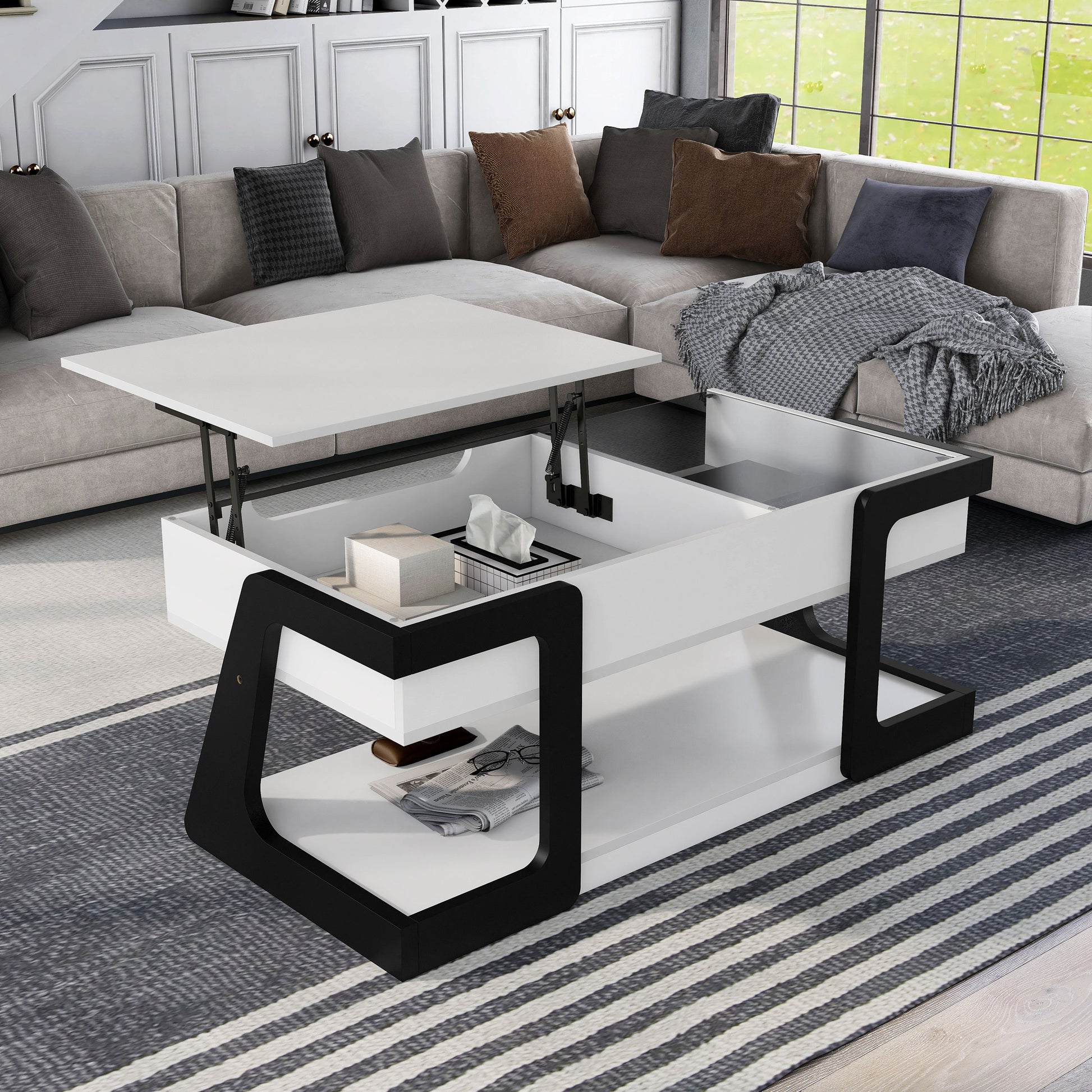 Right angled contemporary white and black lift-top storage coffee table with two shelves and top raised in a living room with accessories